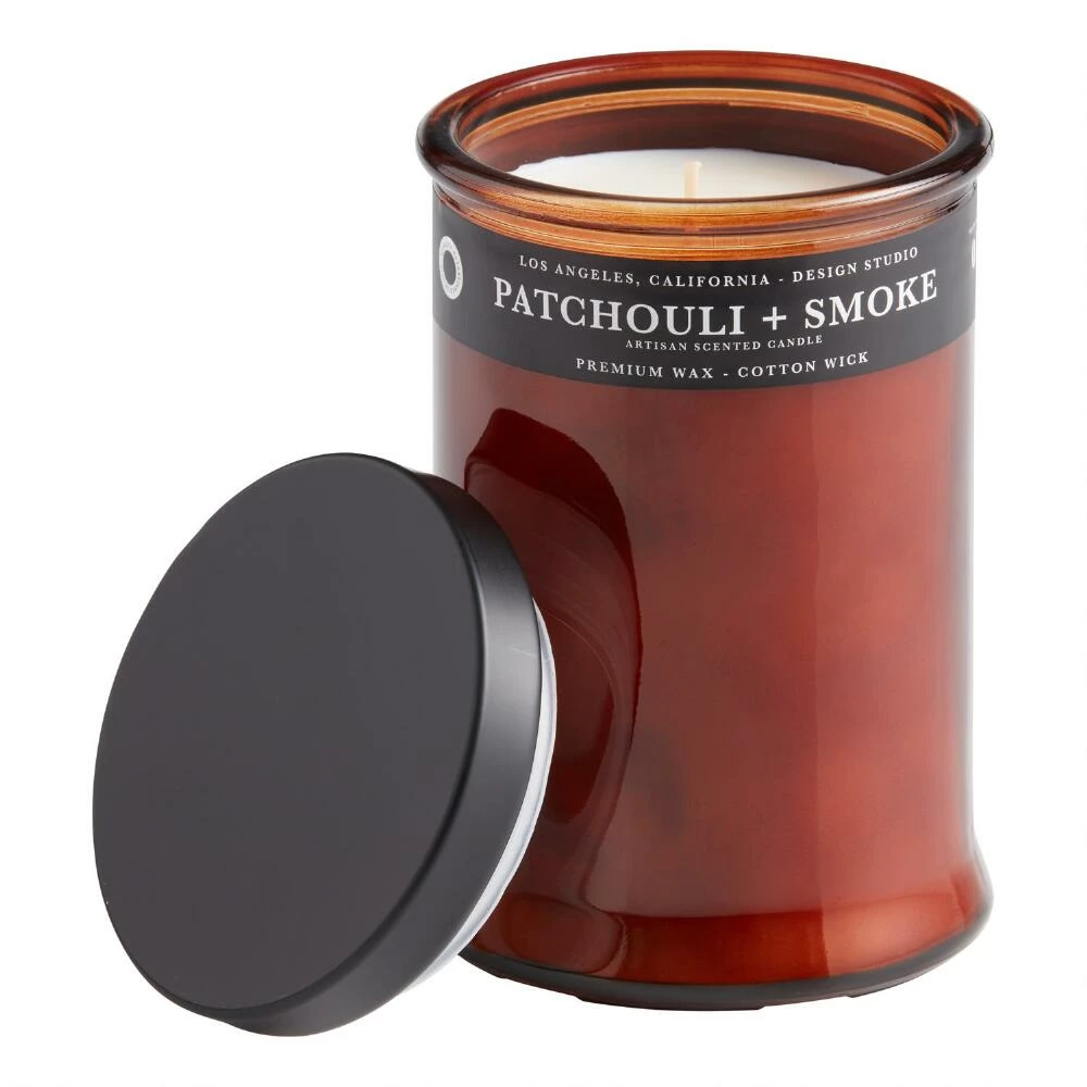 World Market Tall Amber Glass Patchouli and Smoke Scented Candle 1 World Market Tall Amber Glass Patchouli and Smoke Scented Candle