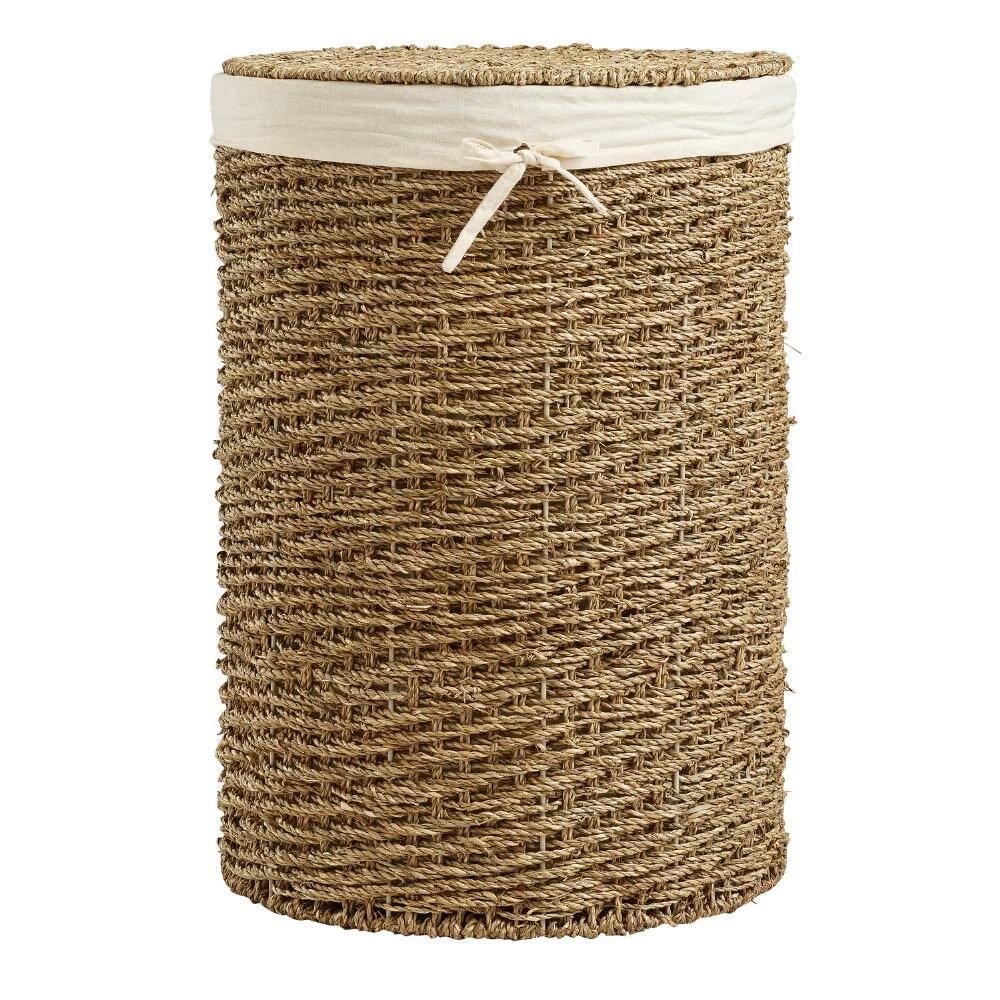World Market Trista Round Seagrass Hamper With Liner And Lid 1 World Market Trista Round Seagrass Hamper With Liner And Lid